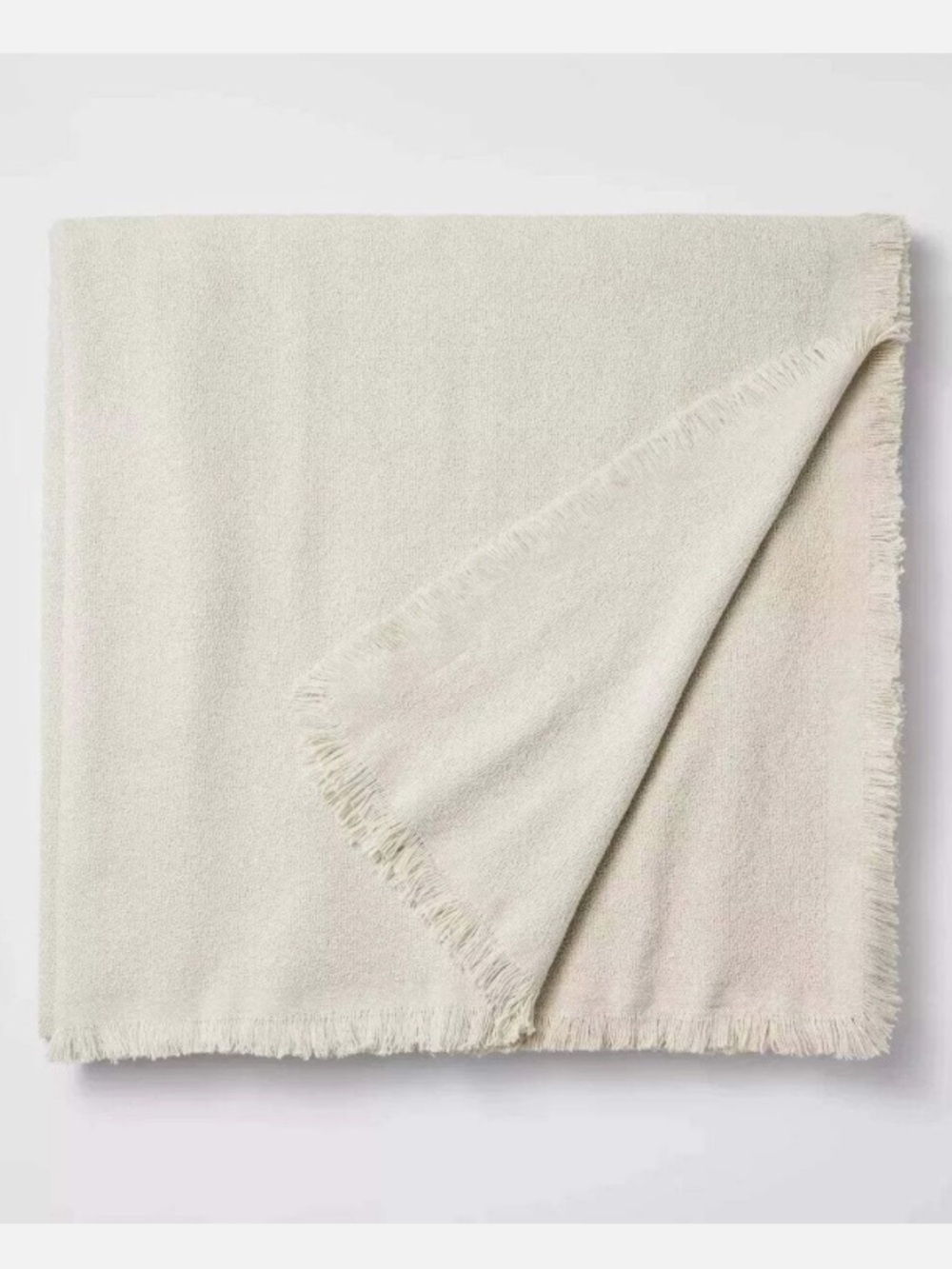 Threshold designed with Studio McGee Cotton Fringe Bed Blanket in Light Beige